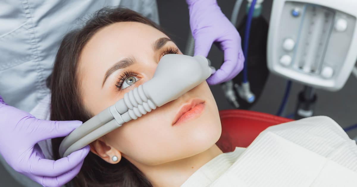 Patient receiving monitored dental care
