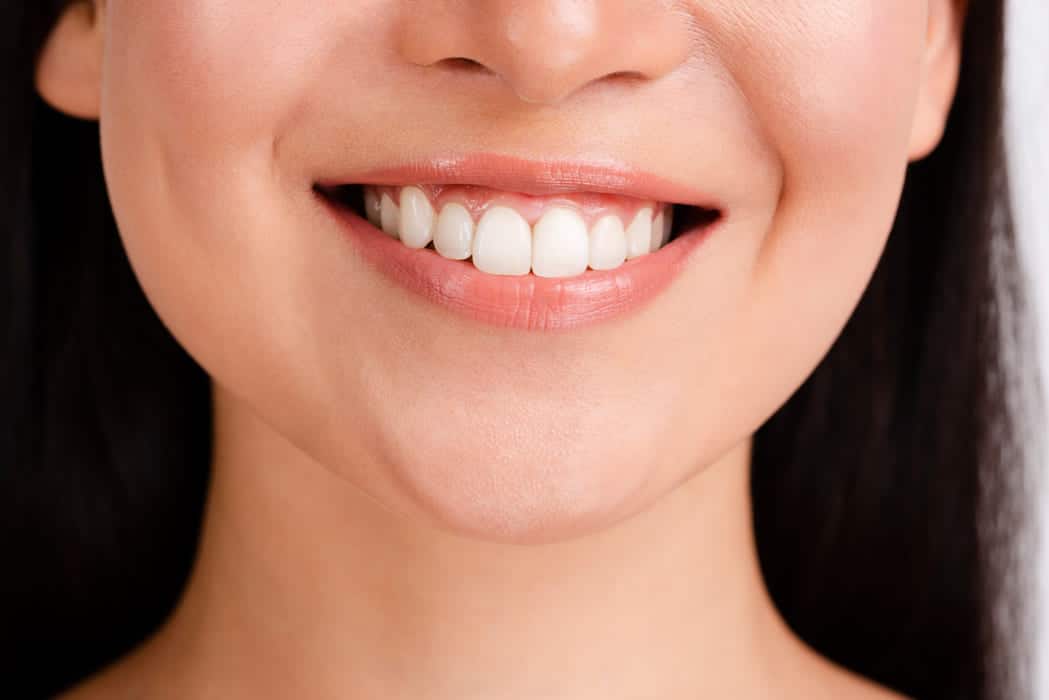 Dental clinician preparing to assess a patient